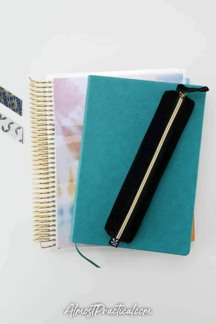 Erin Condren pencil pouch, softbound academic planner, and coiled planner.