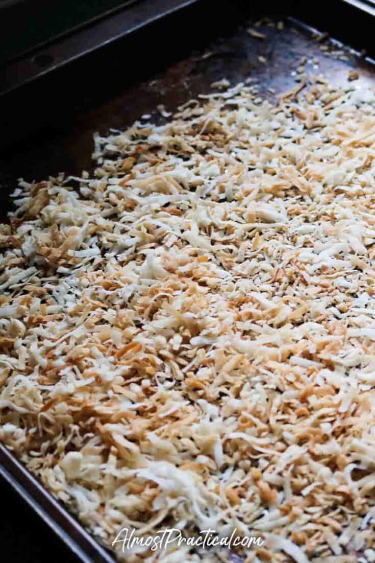 toasted coconut on a baking sheet