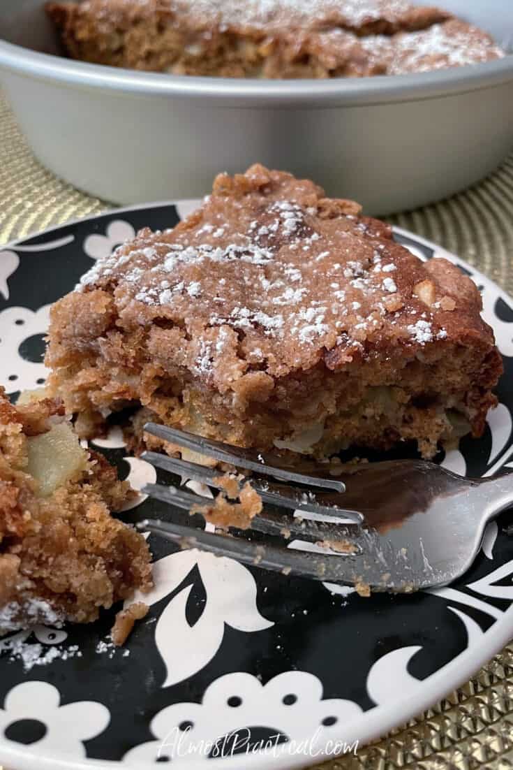 slice of apple coffee cake on plate with fork