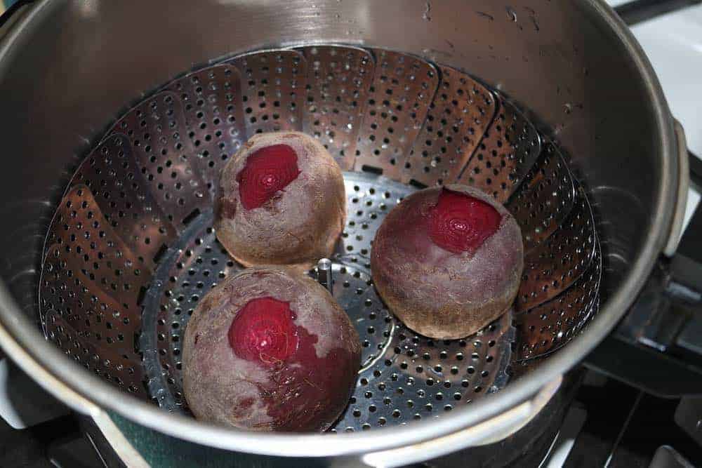 Most of us don't know how to cook beets, even though they are so healthy. Use this recipe to cook beets in a pressure cooker or steam them on the stovetop.