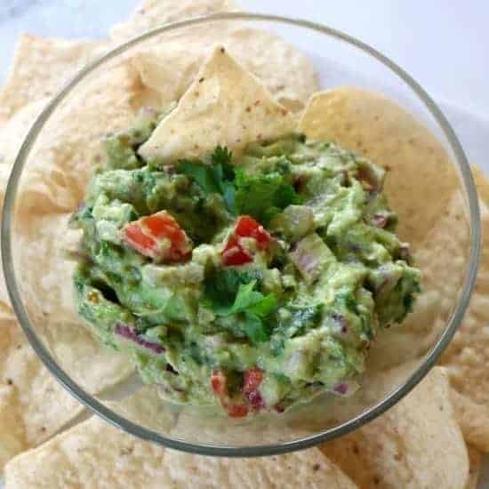 The best guacamole recipe you will ever try. A quick, easy, and healthy snack that is simple to make. Serve this dip for Cinco de Mayo, as a Super Bowl appetizer, or whenever you feel like having a fresh something.