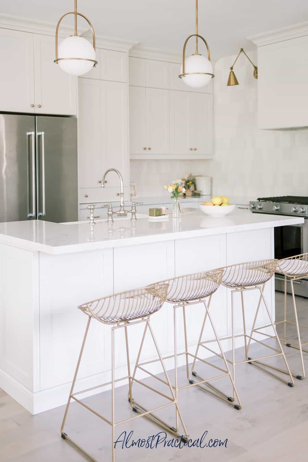 kitchen island with counter height counter and 4 bar stools