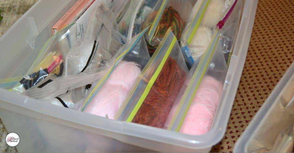 My craft supplies all organized in plastic bins.