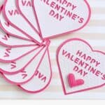 Simple hot pink and white Valentine's Day cards made using a Cricut Machine.