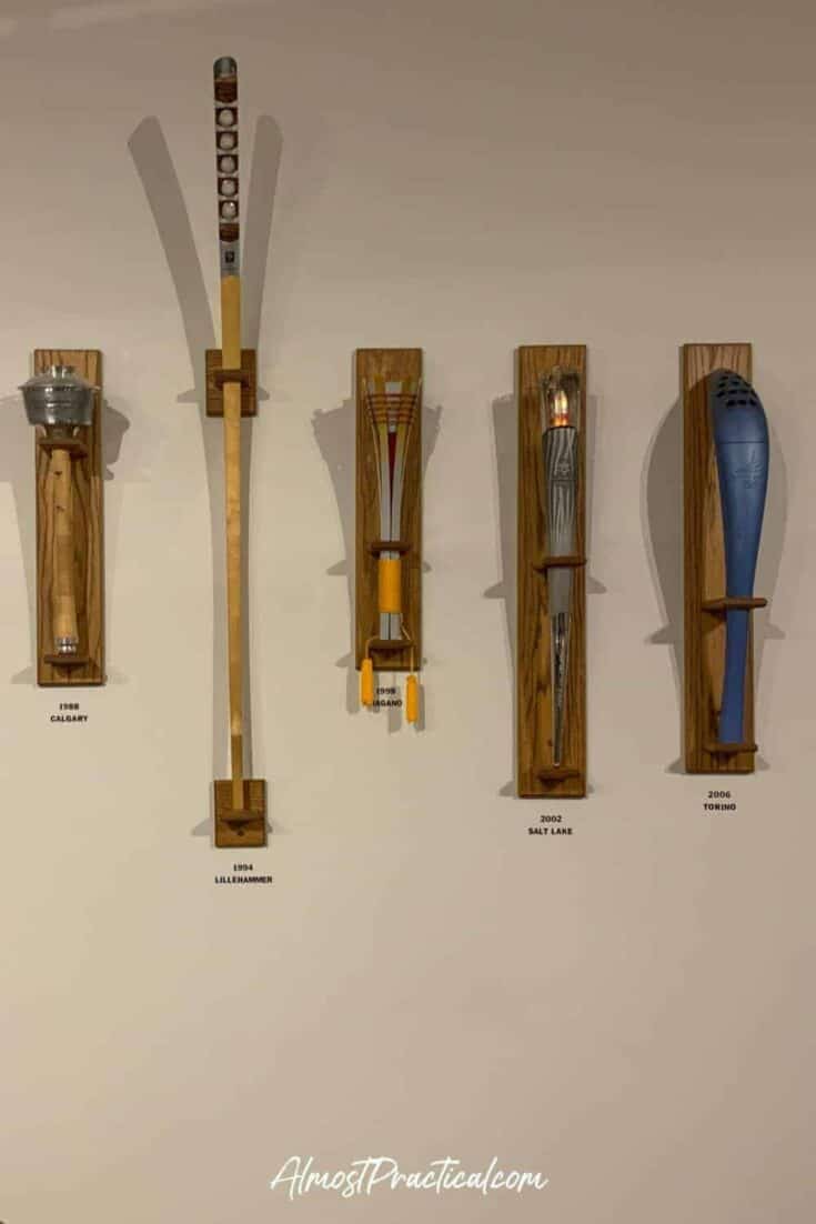 a selection of Olympic torches as displayed at the Olympic Museum in Lake Placid NY.