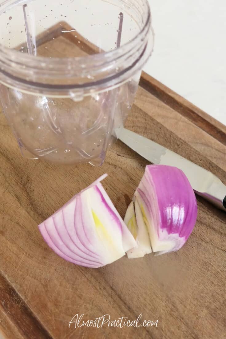 red onions on a cutting board