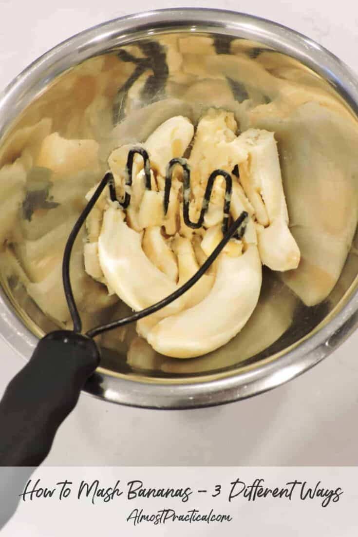 photo of bananas in mixing bowl being mashed with potato masher.