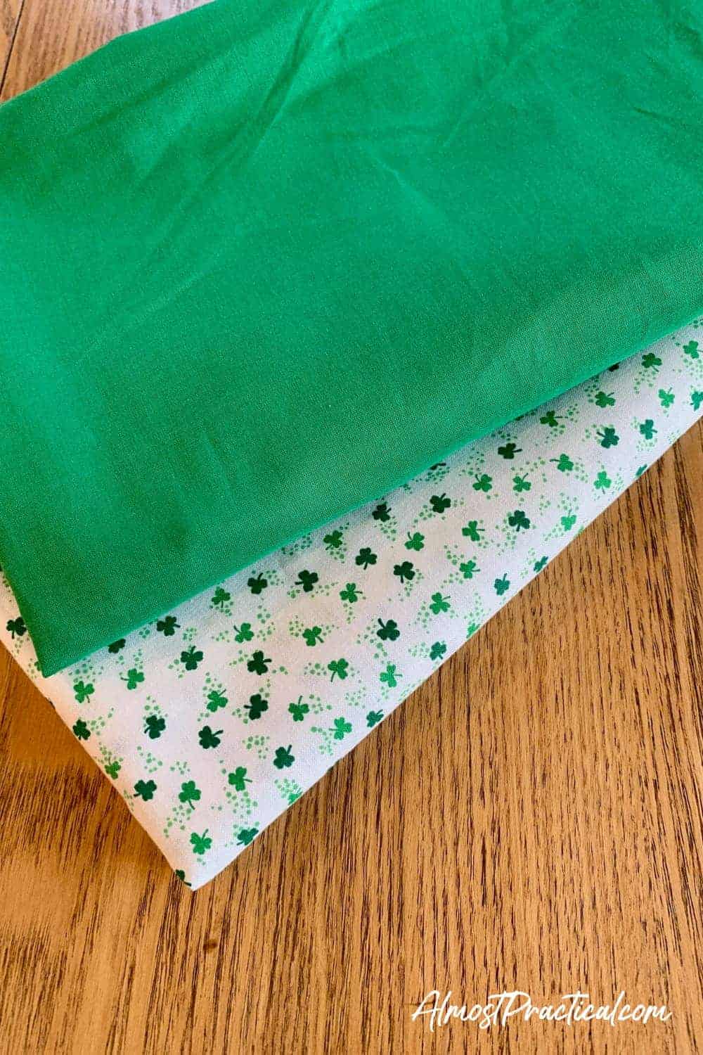 kelly green fabric and white fabric with shamrocks