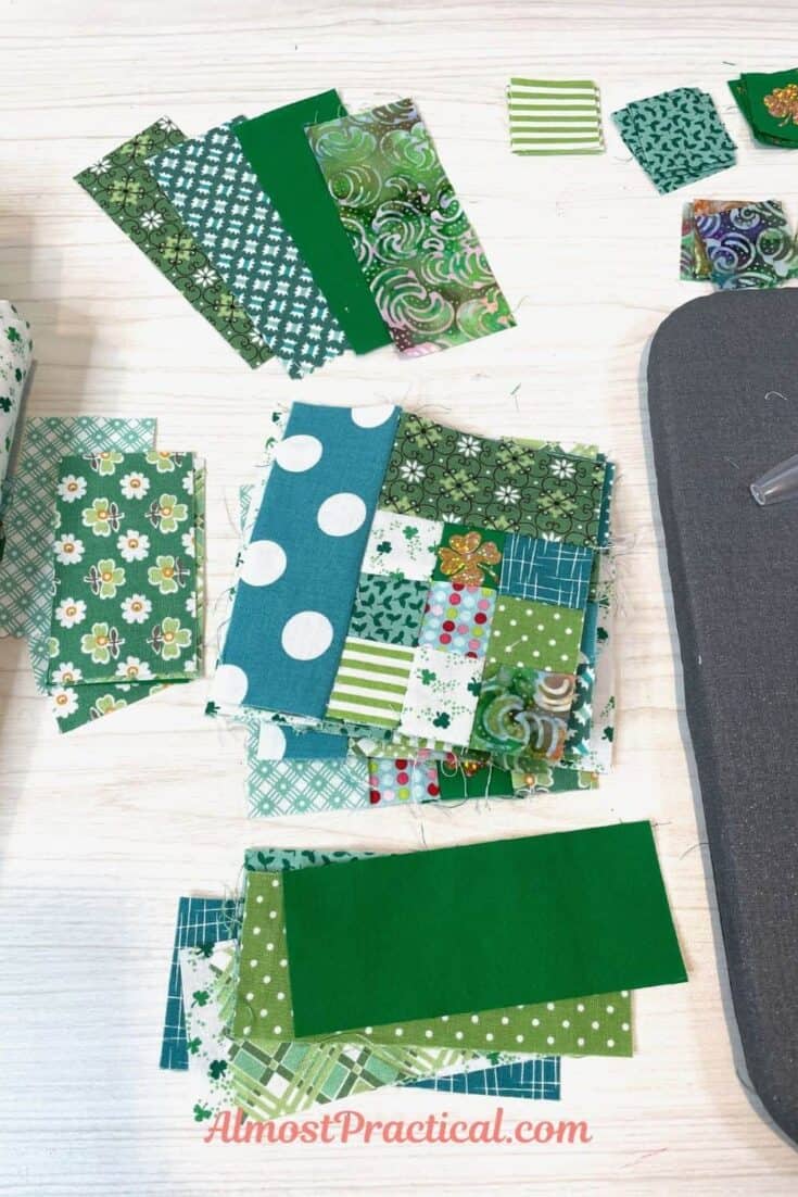 stack of quilt blocks needed for this St. Patrick's Day table runner